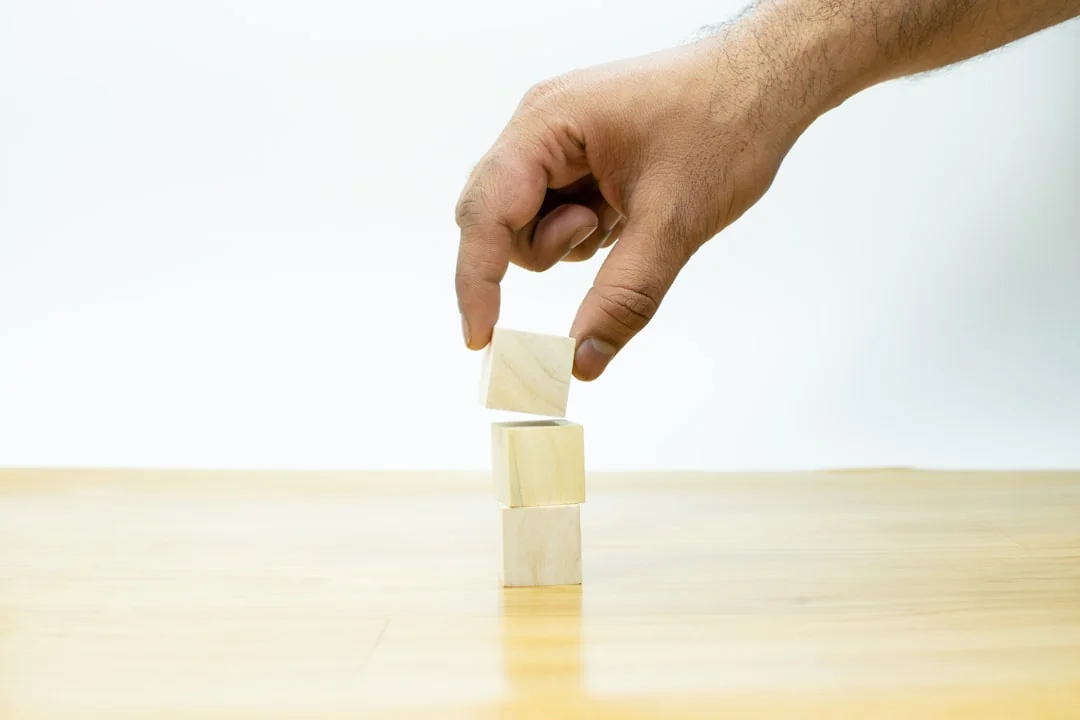 Scrabble tiles arranged to spell SEO Audit on a wooden surface, representing digital marketing strategy.